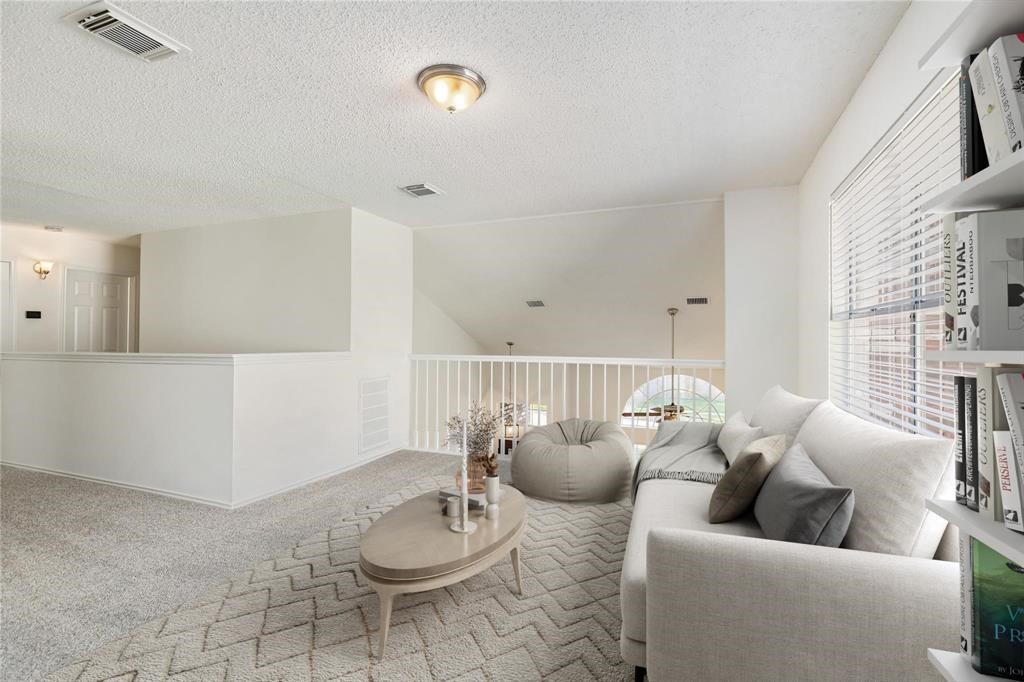9410 Calwood Circle Spring, TX 77379 - Photo 27 of 34 a living room with furniture and a wooden floor