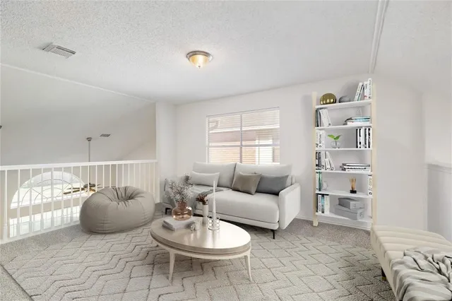 a view of a backyard with large tree