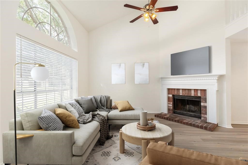 9410 Calwood Circle Spring, TX 77379 - Photo 4 of 34 a living room with furniture and a fireplace