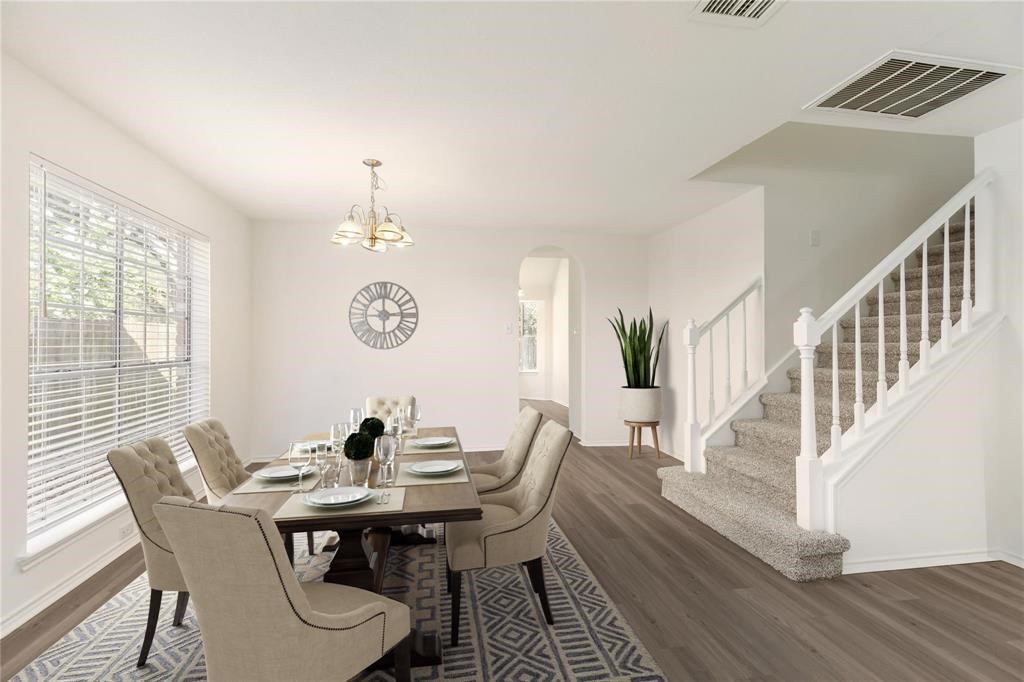 9410 Calwood Circle Spring, TX 77379 - Photo 6 of 34 a view of a dining room with furniture window and wooden floor