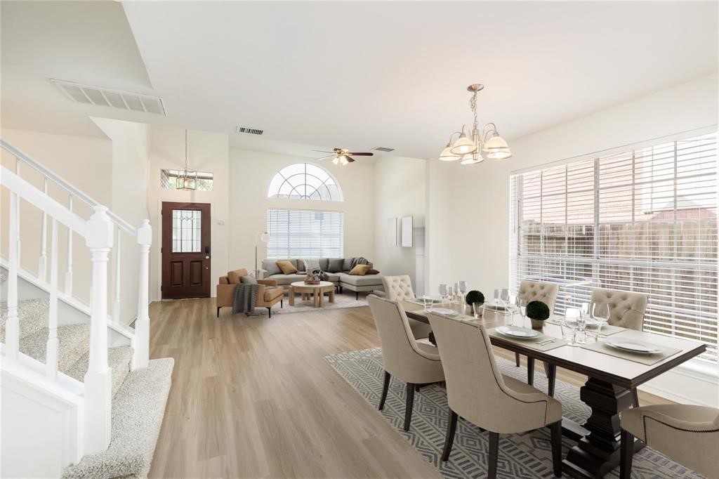 9410 Calwood Circle Spring, TX 77379 - Photo 7 of 34 a view of a dining room with furniture window and wooden floor