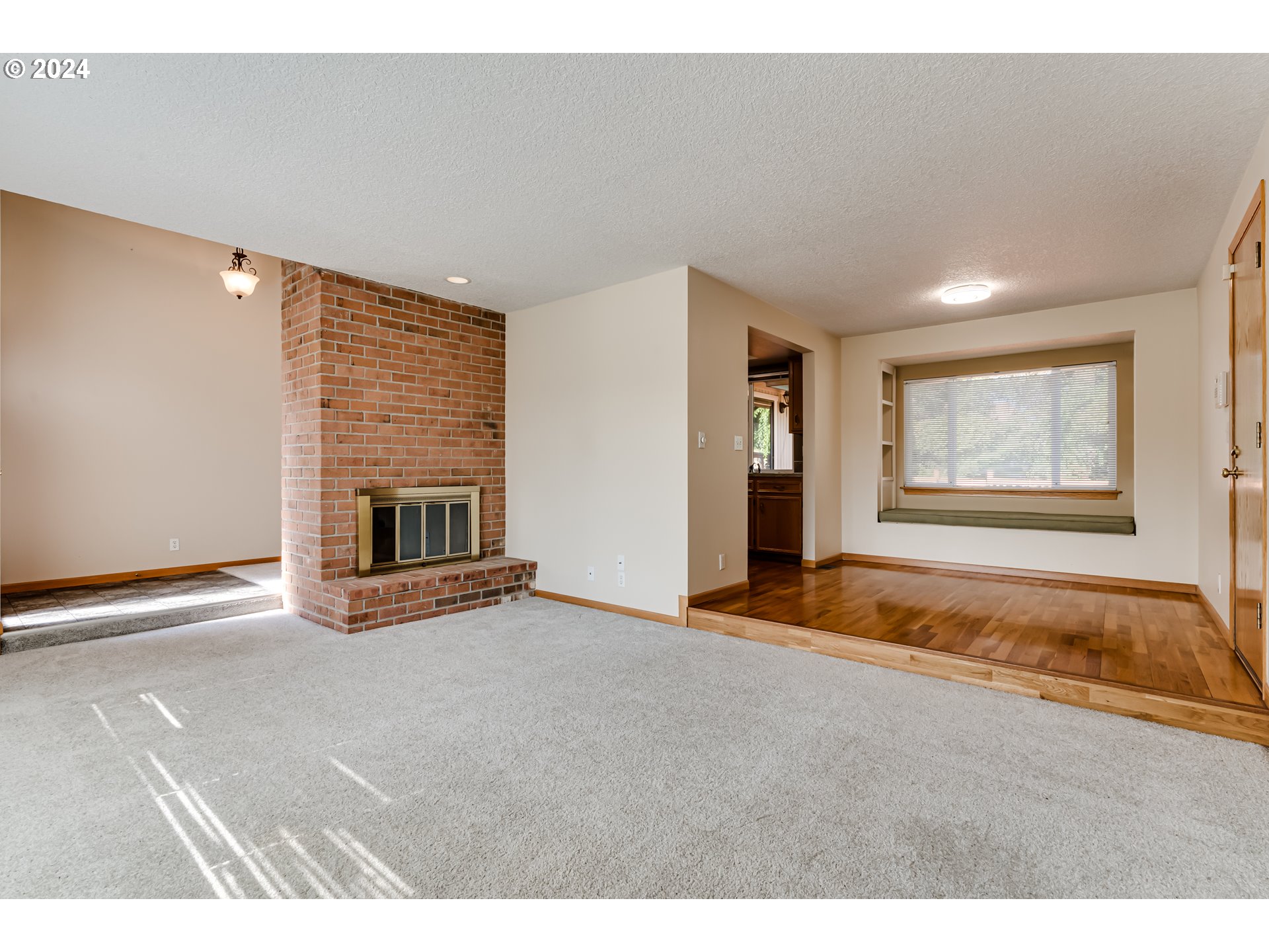 530 66th Street Springfield, OR 97478 - Photo 6 of 36 a view of an empty room with a fireplace