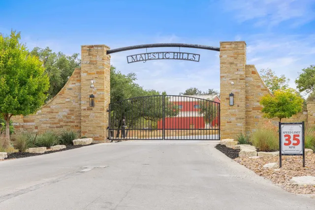 a view of swimming pool with outdoor seating and yard