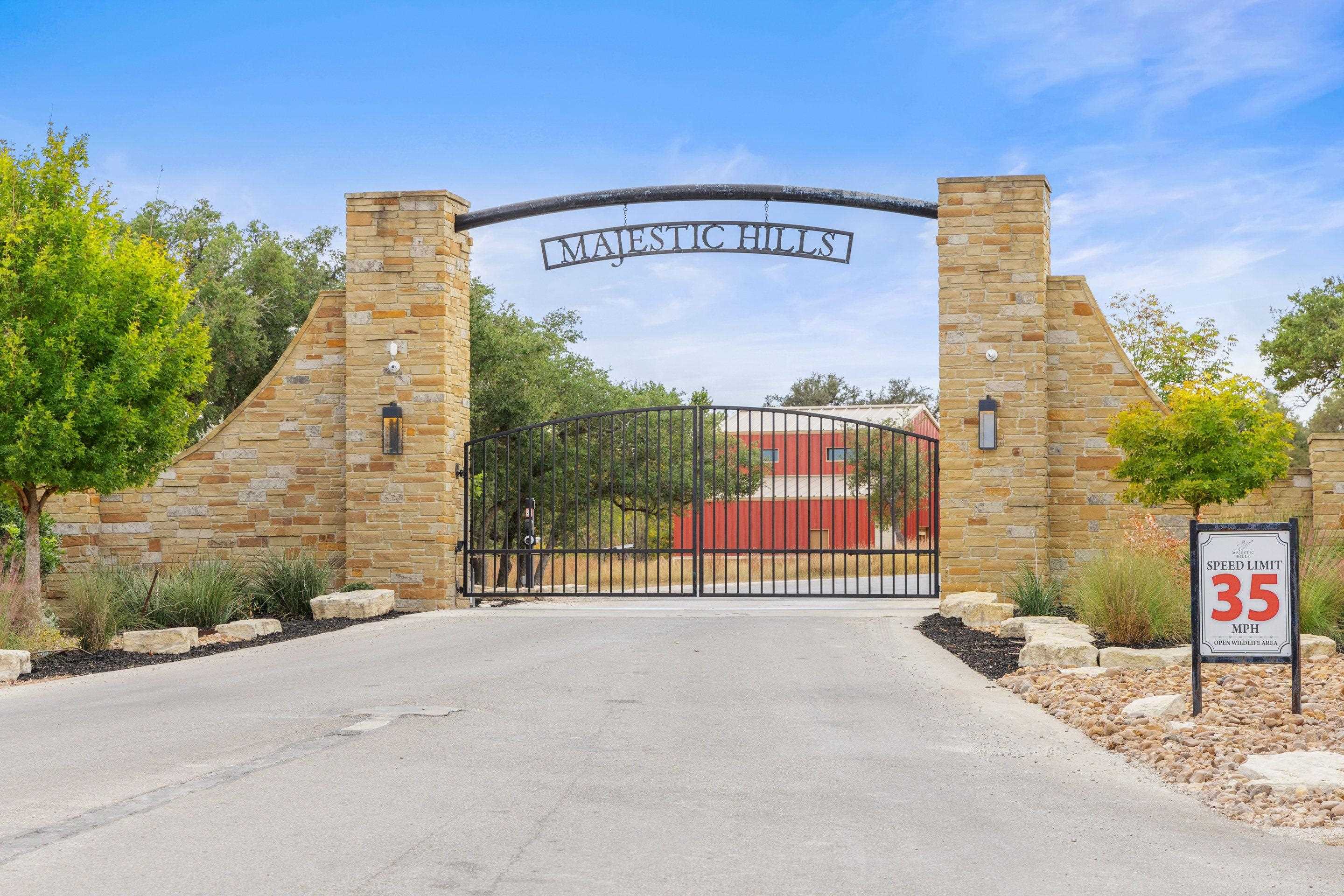 Lot 112 Star Point Circle Blanco, TX 78606 - Photo 22 of 25 a view of a street with a building in the background