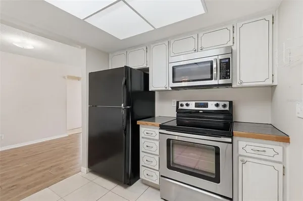 a kitchen with a sink and a window