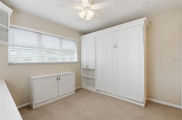 a room that has a chair and a stove in it