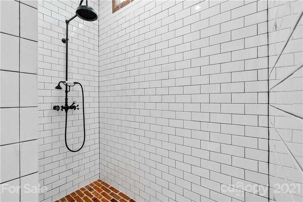 1198 Garvin Road York, SC 29745 - Photo 11 of 34 a bathroom with a shower