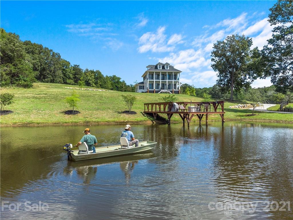 1198 Garvin Road York, SC 29745 - Photo 12 of 34 a view of a lake with outdoor space