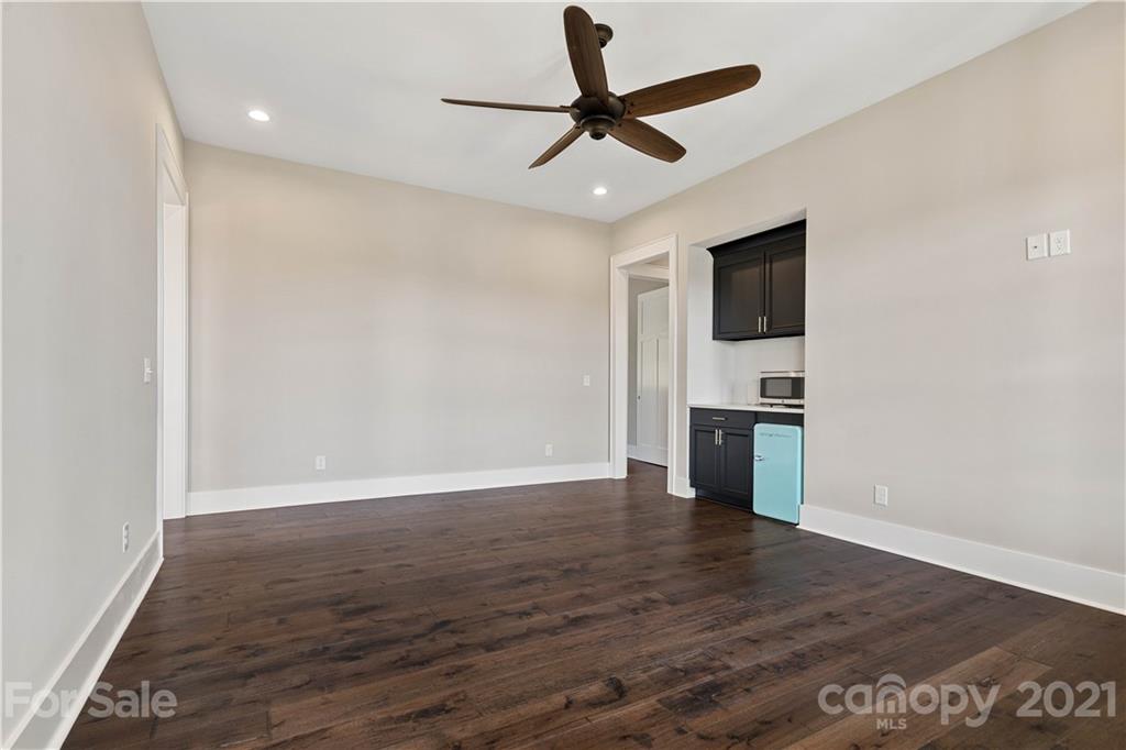 1198 Garvin Road York, SC 29745 - Photo 16 of 34 a view of empty room with wooden floor and window