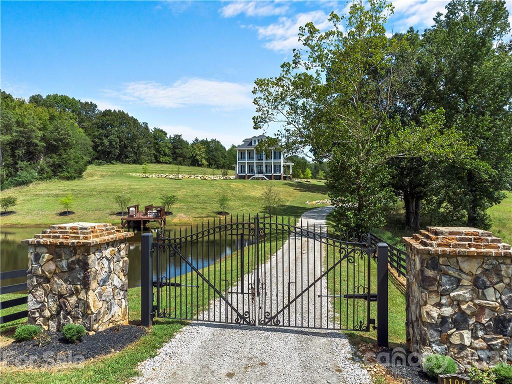 1198 Garvin Road York, SC 29745 - Photo 22 of 34 a view of a deck with a garden