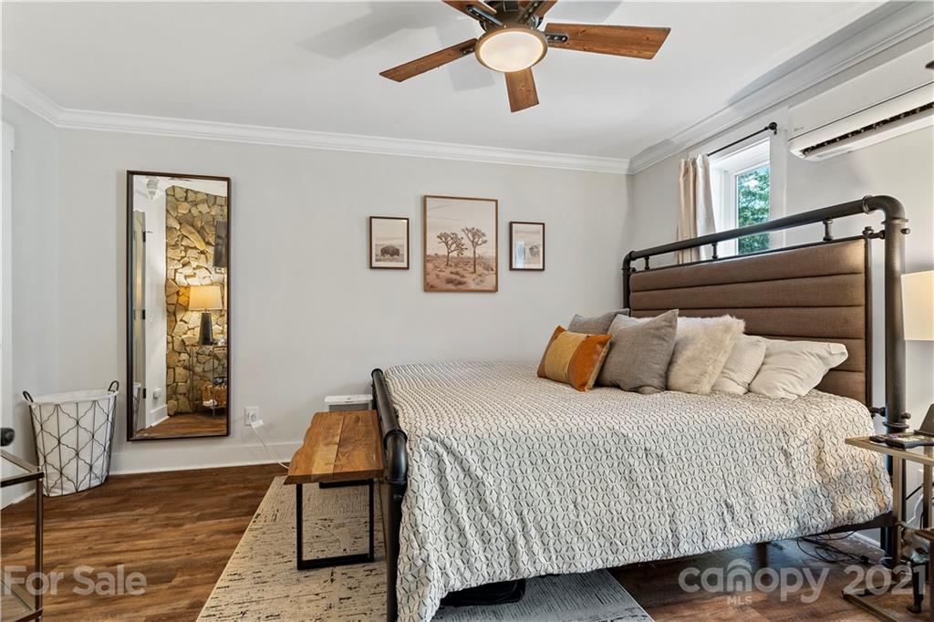 1198 Garvin Road York, SC 29745 - Photo 24 of 34 a bedroom with a bed and wooden floor