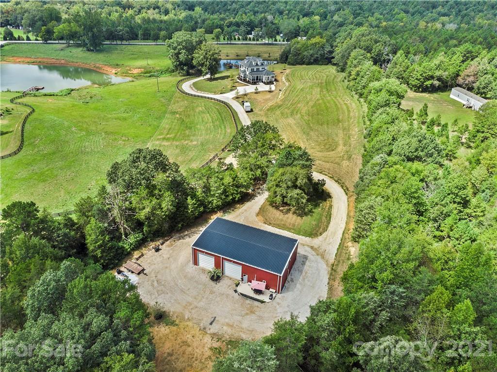 1198 Garvin Road York, SC 29745 - Photo 27 of 34 an aerial view of a house with a yard and lake view
