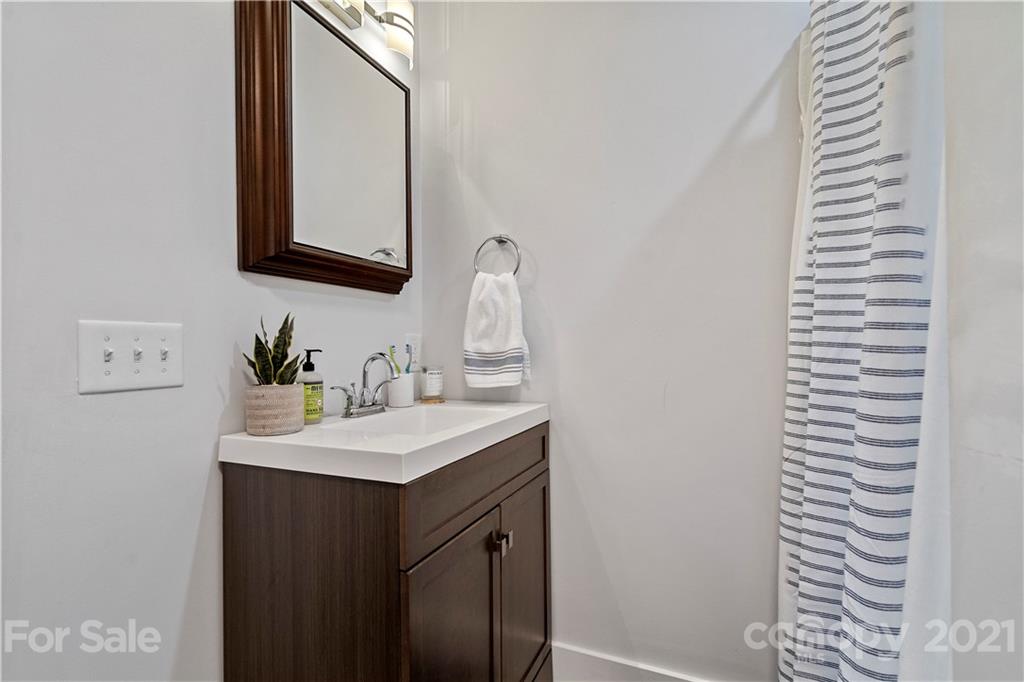 1198 Garvin Road York, SC 29745 - Photo 28 of 34 a bathroom with a sink and a mirror