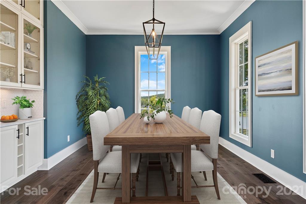 1198 Garvin Road York, SC 29745 - Photo 5 of 34 a view of a dining room with furniture window and wooden floor