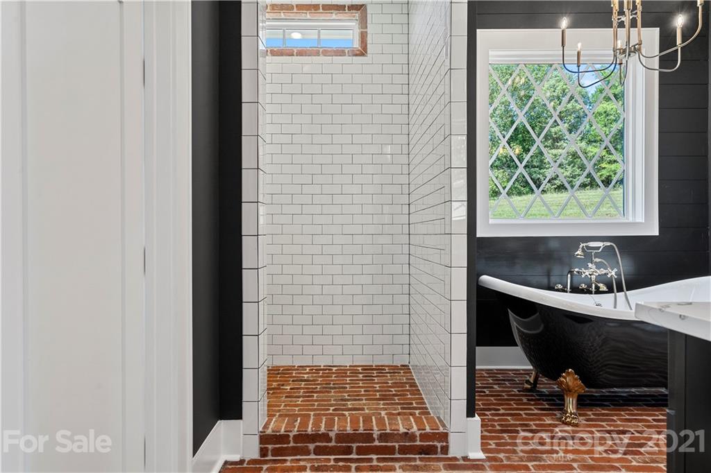 1198 Garvin Road York, SC 29745 - Photo 8 of 34 a bathroom with a sink a toilet and next to a window