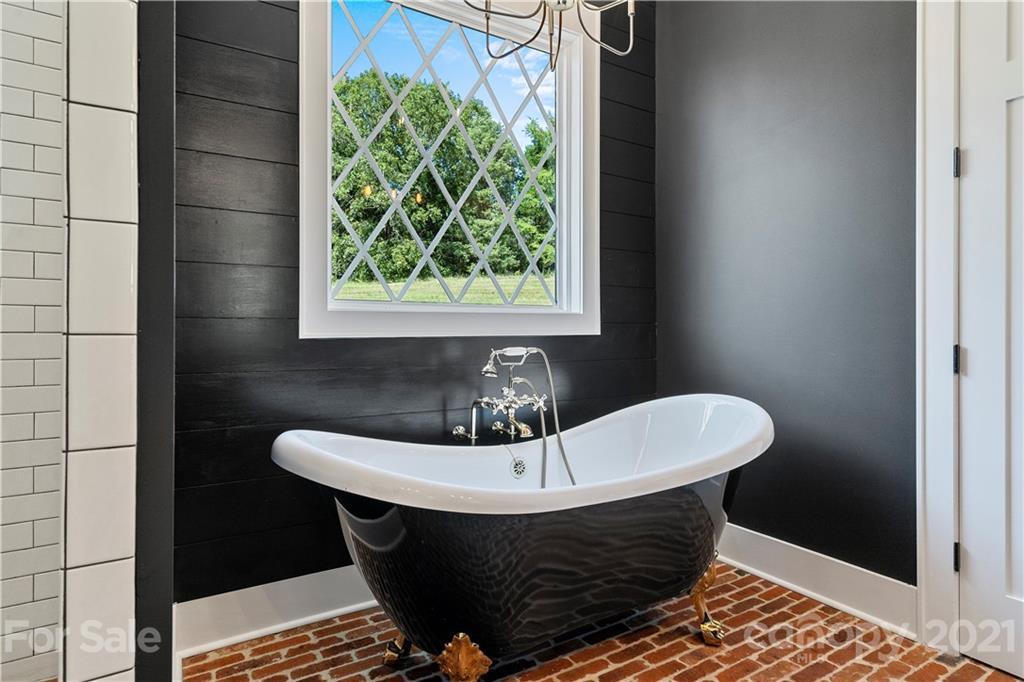 1198 Garvin Road York, SC 29745 - Photo 10 of 34 a bathroom with a sink and mirror