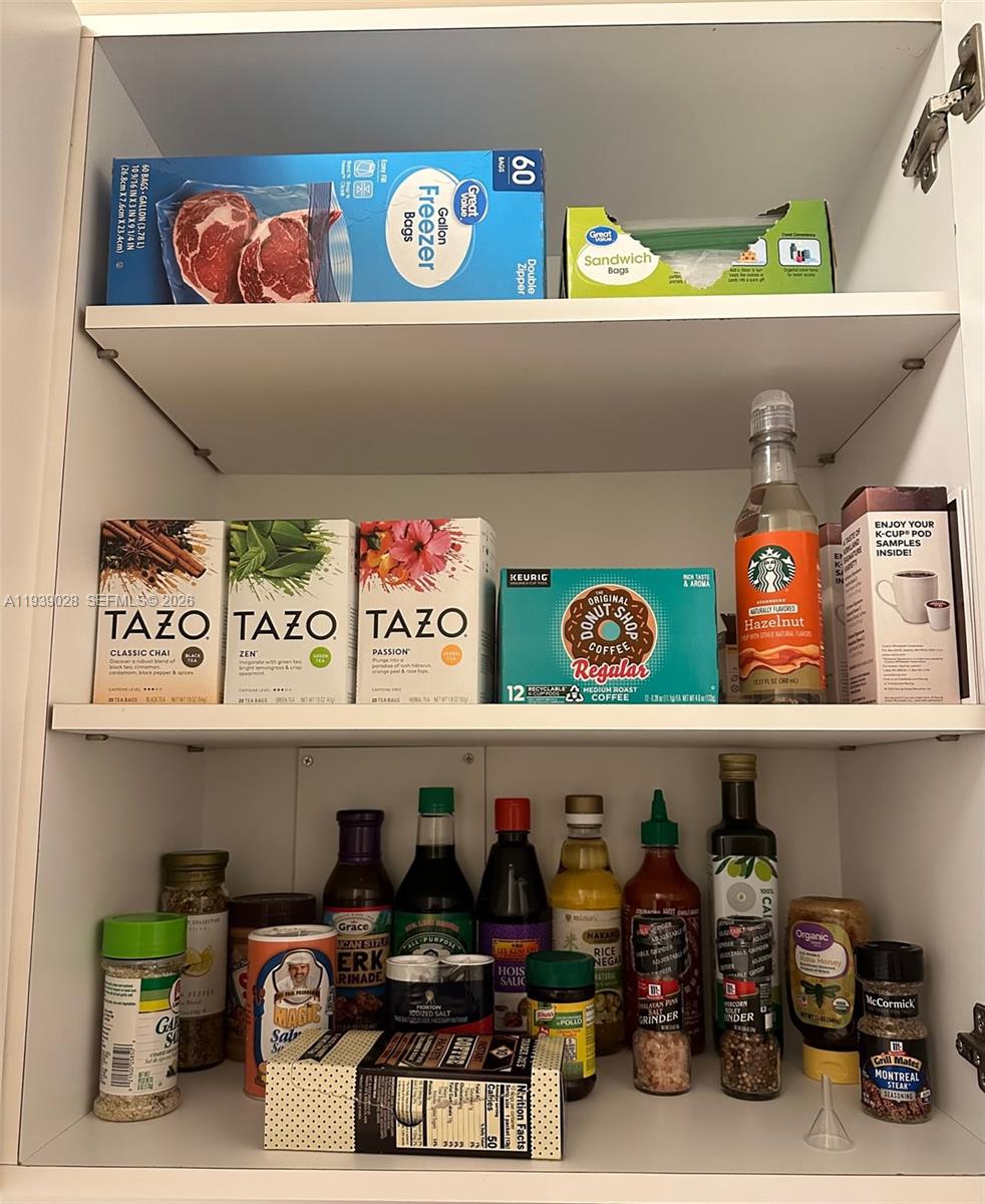 100 Lincoln Road, Unit 431 Miami Beach, FL 33139 - Photo 19 of 34 a room with lots of different colored cloths