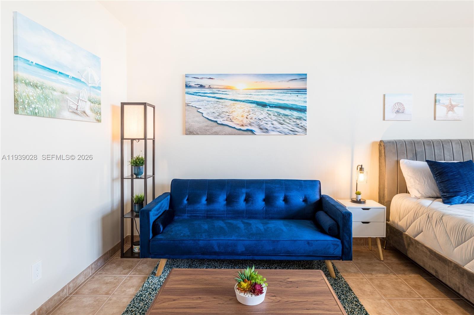 100 Lincoln Road, Unit 431 Miami Beach, FL 33139 - Photo 10 of 34 a living room with furniture and a rug