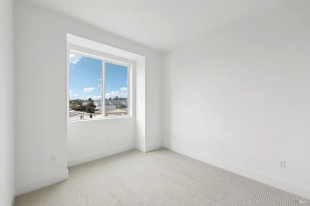 a view of a room that has a dresser