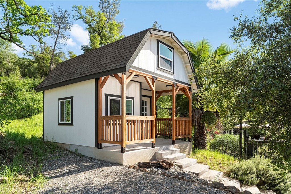 2262 Honey Run Road Chico, CA 95928 - Photo 31 of 74 A detached, fully finished studio offers flexible space for an office, art studio, or guest overflow—complete with a loft, closet, and mini-split system.