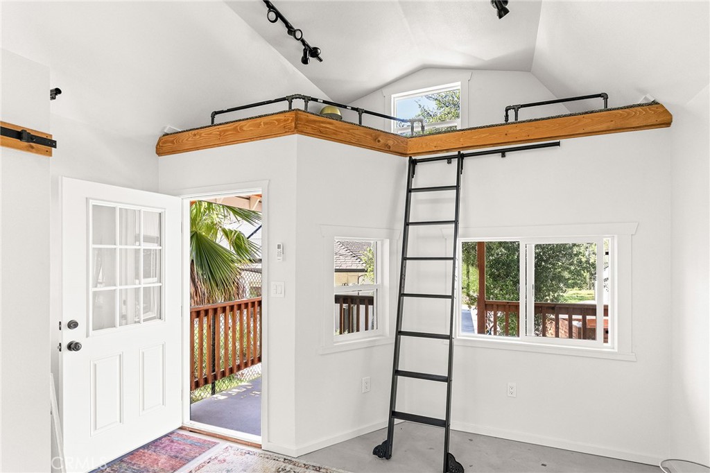 2262 Honey Run Road Chico, CA 95928 - Photo 33 of 74 A detached, fully finished studio offers flexible space for an office, art studio, or guest overflow—complete with a loft, closet, and mini-split system.