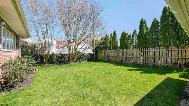a view of a backyard with a garden