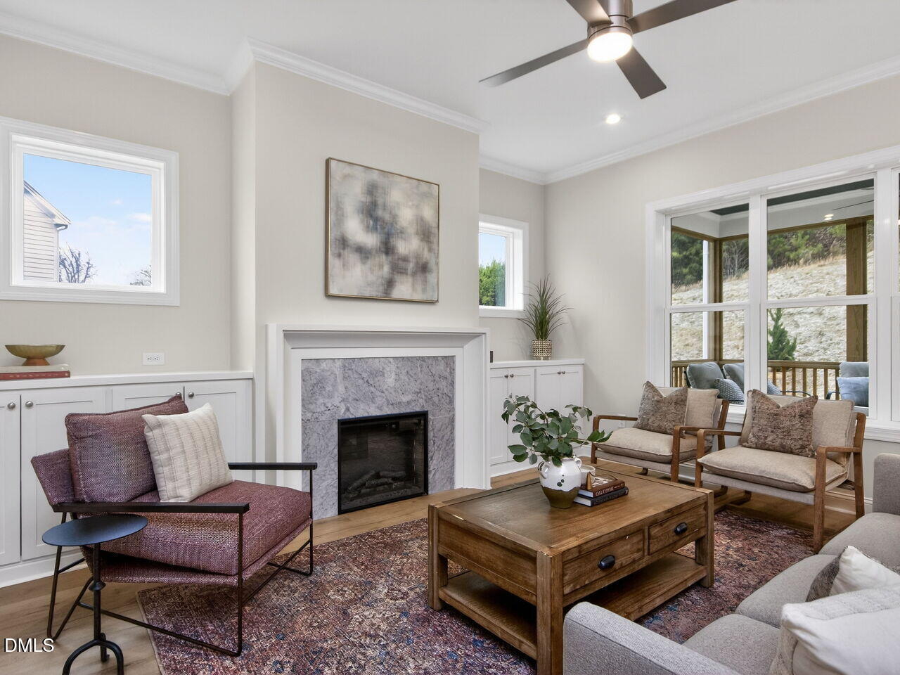6044 Scalybark Road Durham, NC 27712 - Photo 12 of 39 a living room with furniture and a fireplace