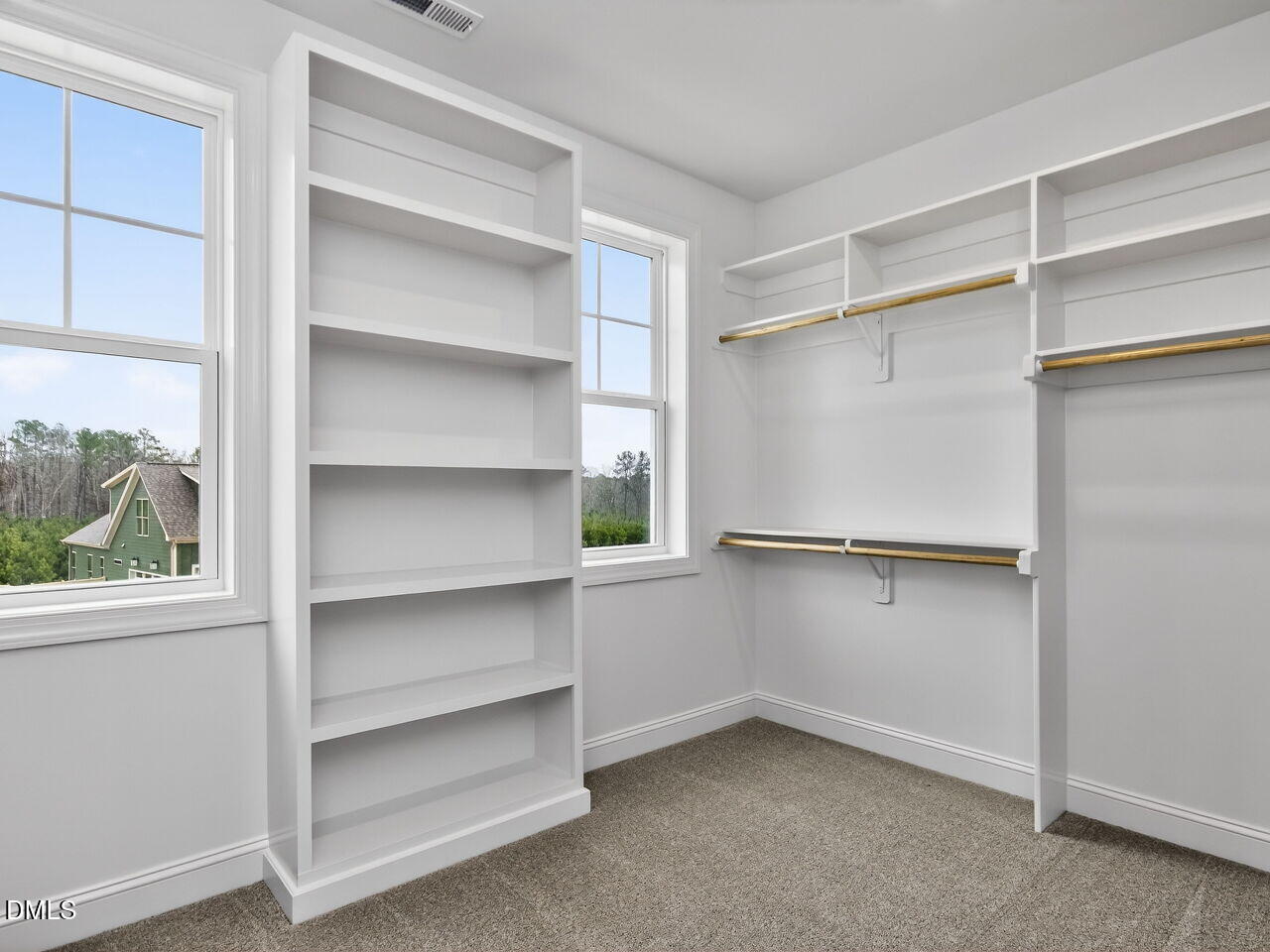 6044 Scalybark Road Durham, NC 27712 - Photo 28 of 39 a view of an empty walk in closet