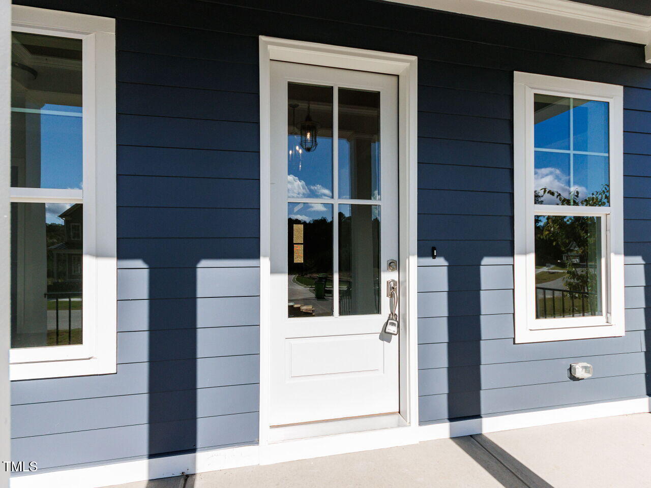 6044 Scalybark Road Durham, NC 27712 - Photo 3 of 32 004-1280x960-front-door