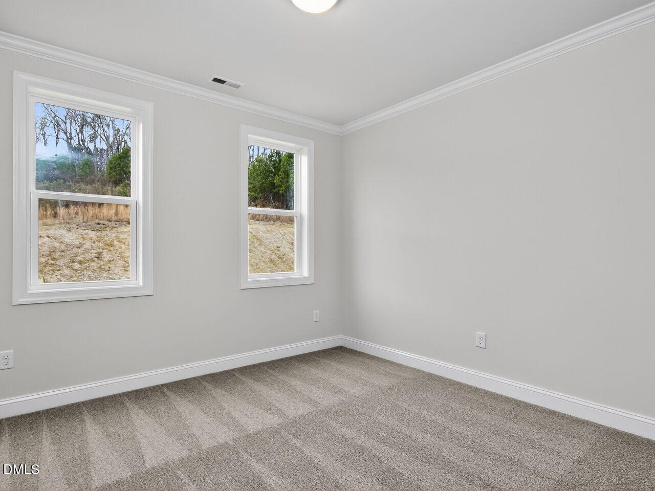 6044 Scalybark Road Durham, NC 27712 - Photo 33 of 39 a view of an empty room with a window