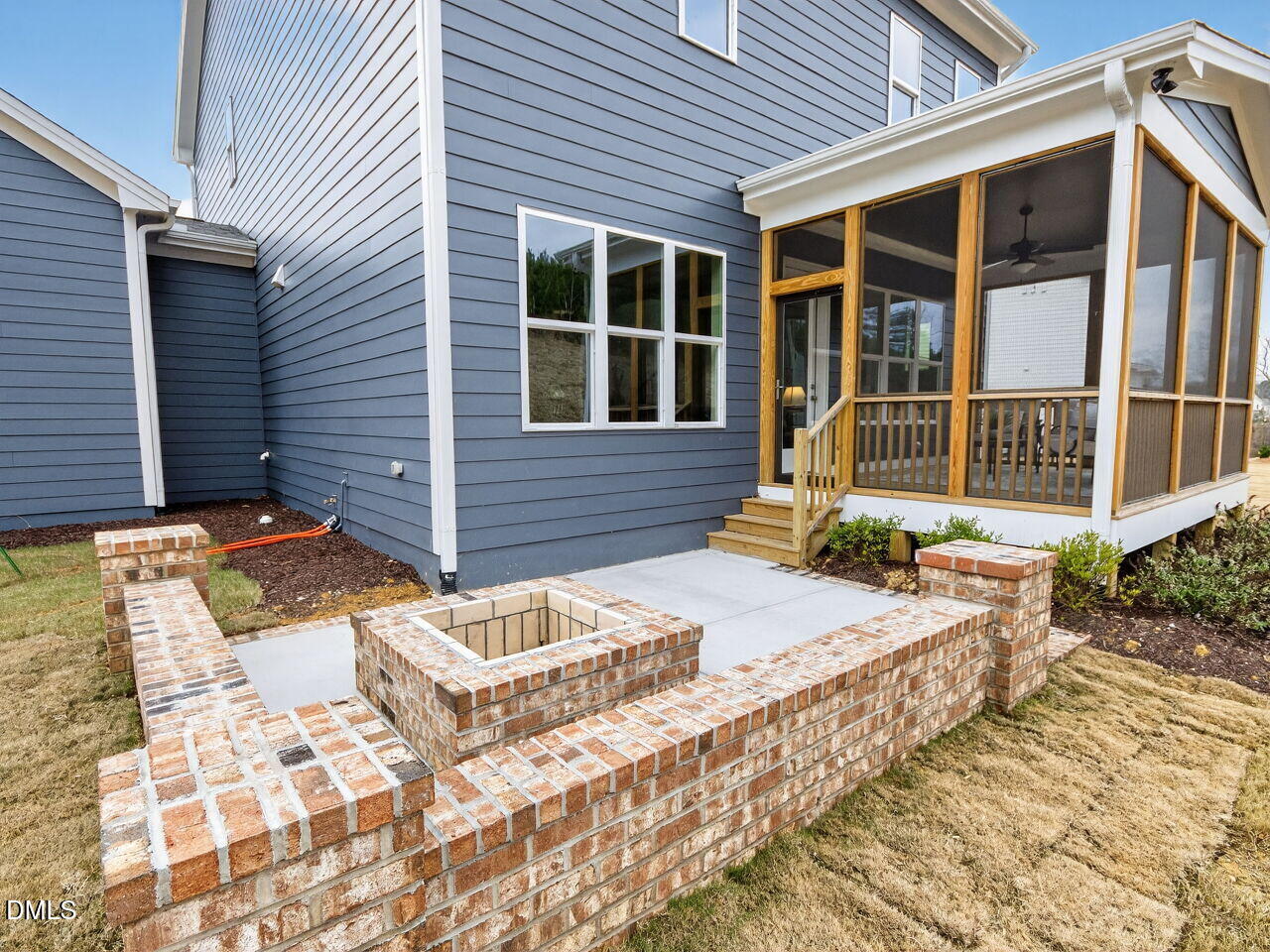 6044 Scalybark Road Durham, NC 27712 - Photo 38 of 39 a view of a house with backyard and wooden fence