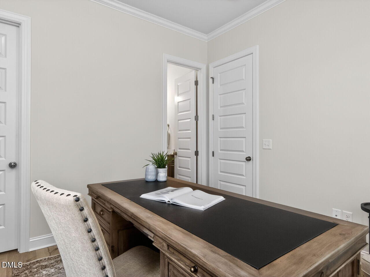 6044 Scalybark Road Durham, NC 27712 - Photo 9 of 39 a living room with a table