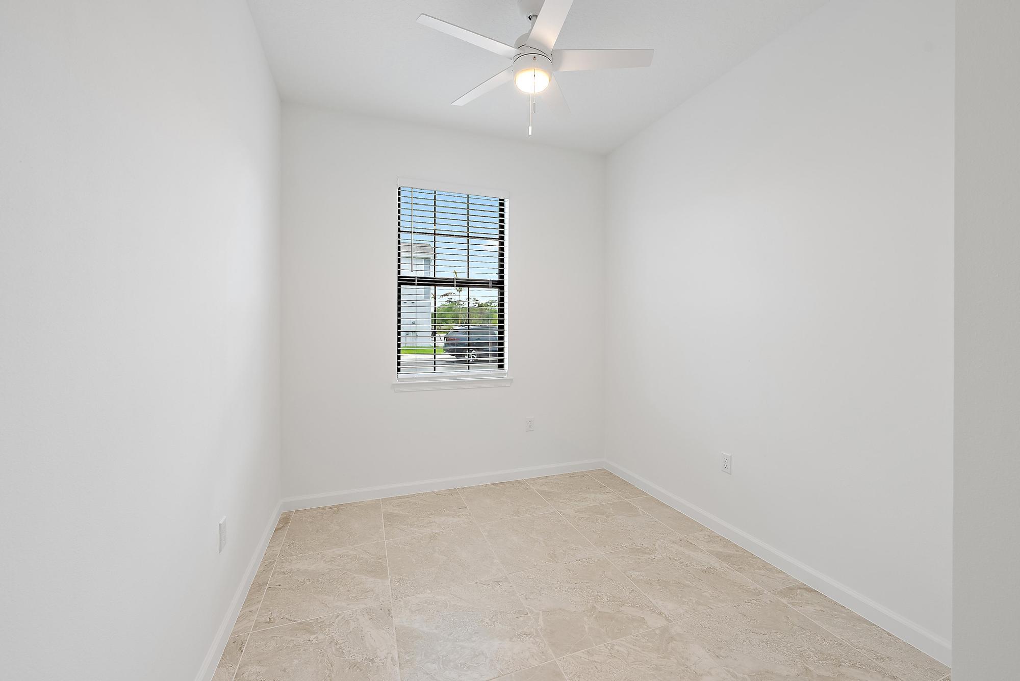 501 Southwest Sally Way Stuart, FL 34997 - Photo 24 of 55 an empty room with a window