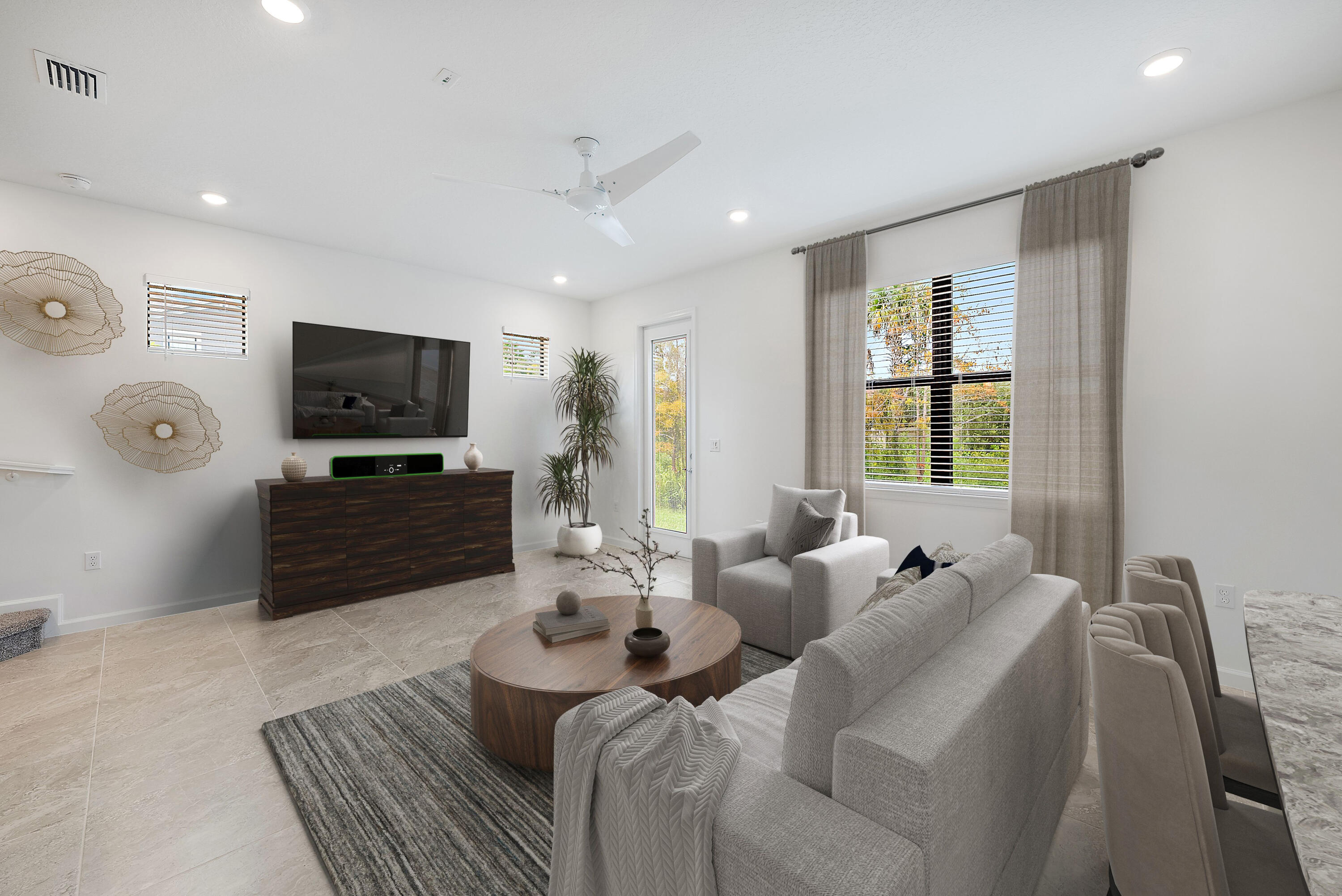 501 Southwest Sally Way Stuart, FL 34997 - Photo 31 of 55 a living room with furniture a flat screen tv and a window