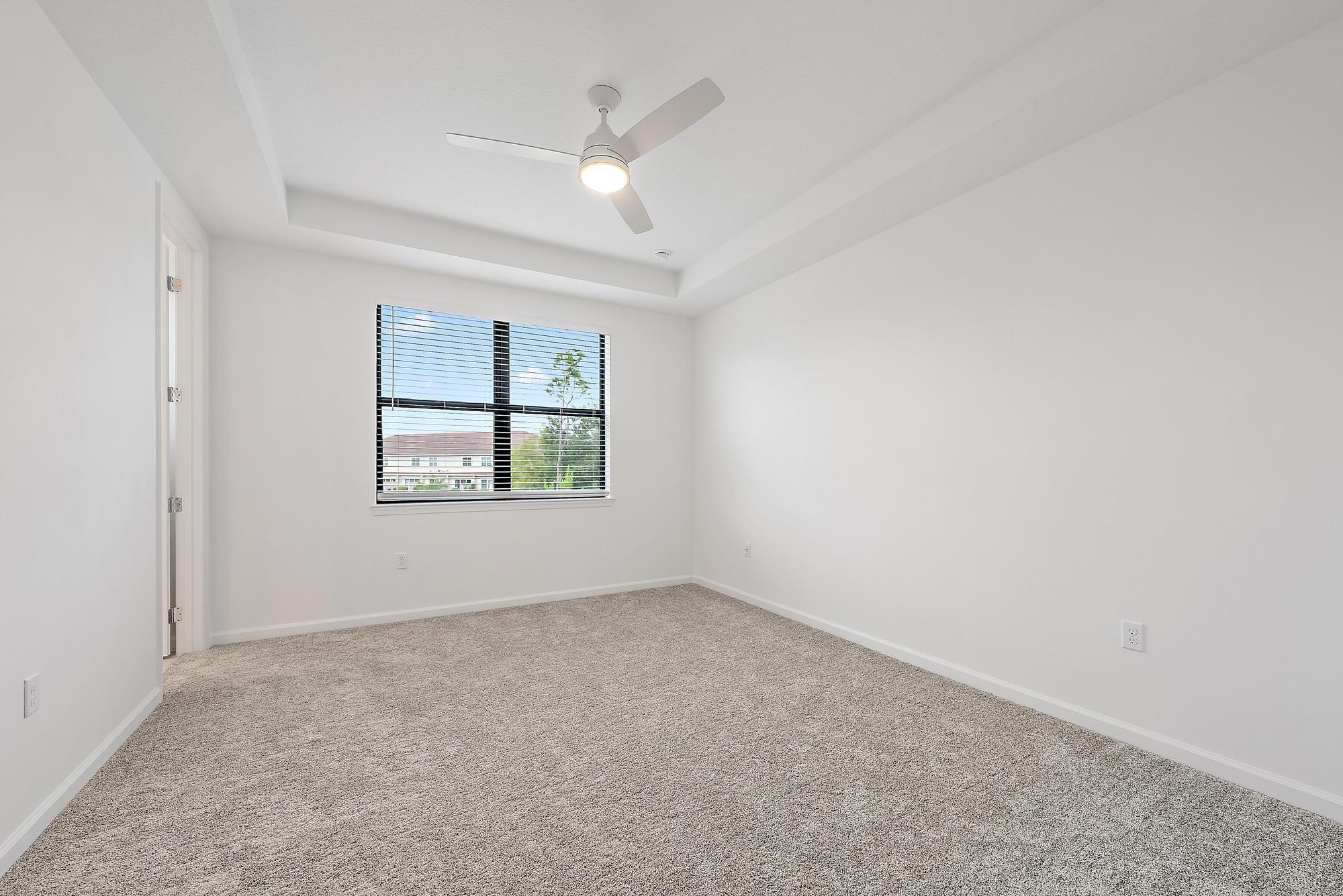 501 Southwest Sally Way Stuart, FL 34997 - Photo 35 of 55 an empty room with windows and closet