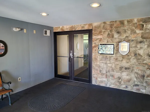 a view of a hallway with elevator