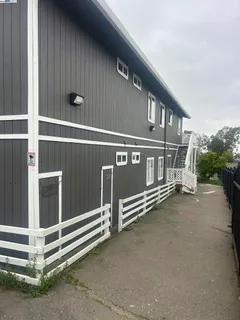 a view of a house with a street