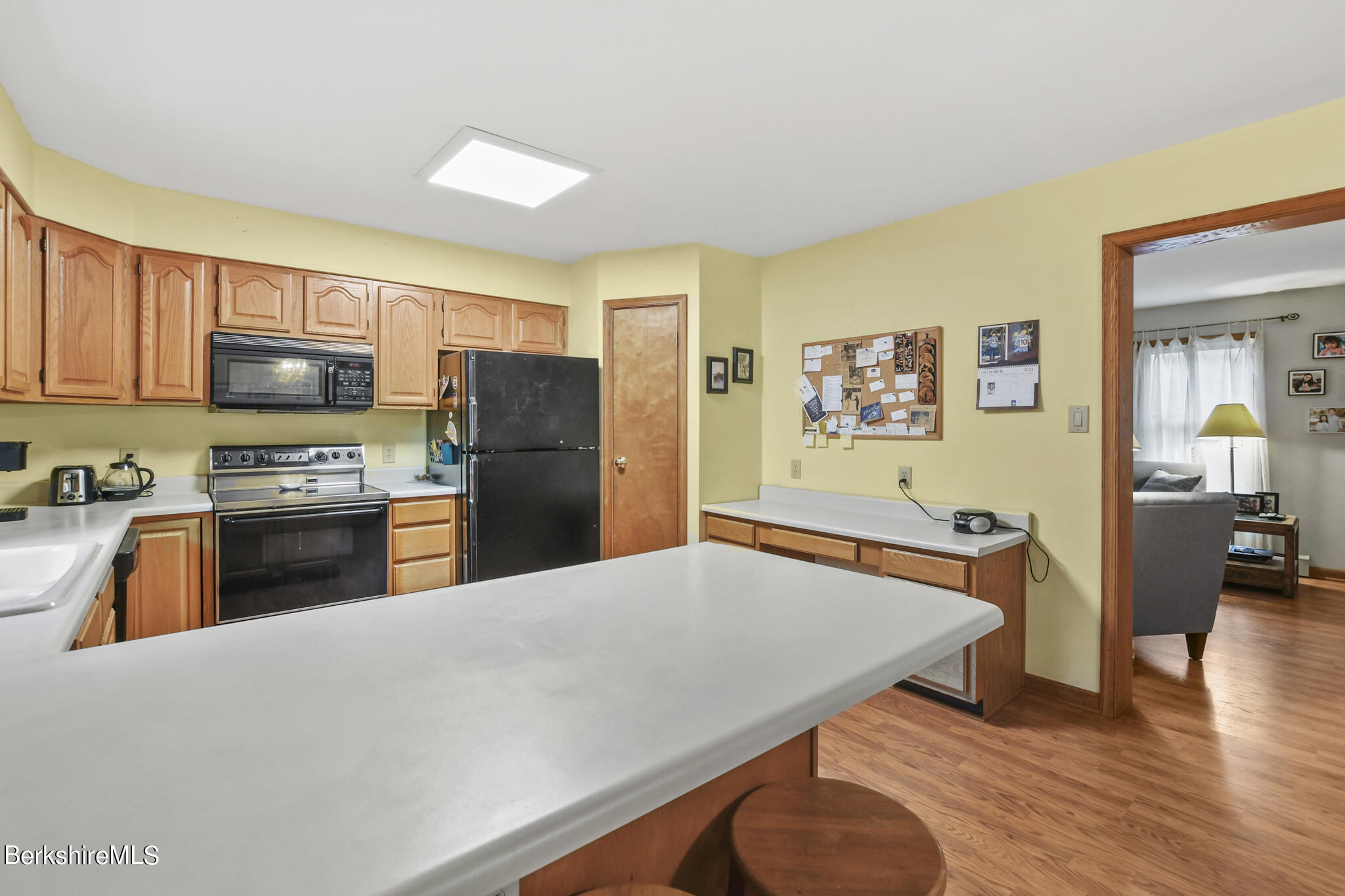 781 E Road Clarksburg, MA 01247 - Photo 19 of 51 a kitchen with stainless steel appliances granite countertop a refrigerator and a stove top oven