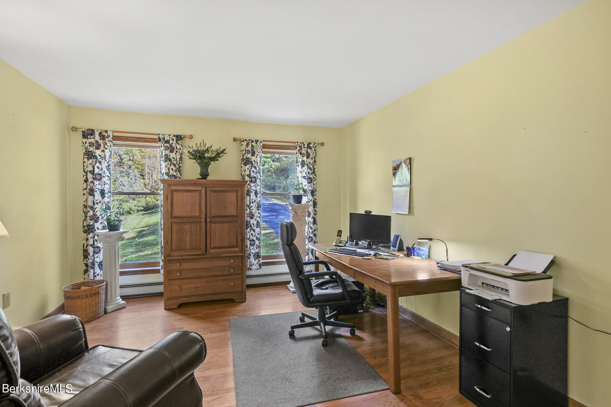 781 E Road Clarksburg, MA 01247 - Photo 22 of 51 a view of a workspace with furniture and a window