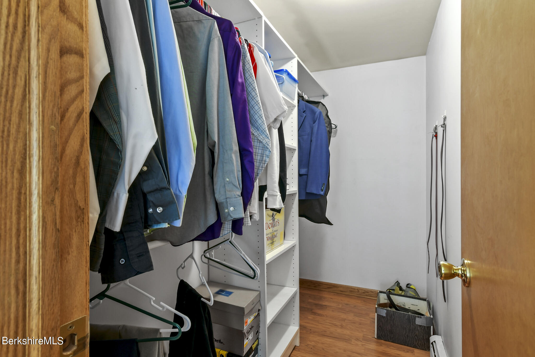 781 E Road Clarksburg, MA 01247 - Photo 29 of 51 a view of walk in closet with clothes and shoes