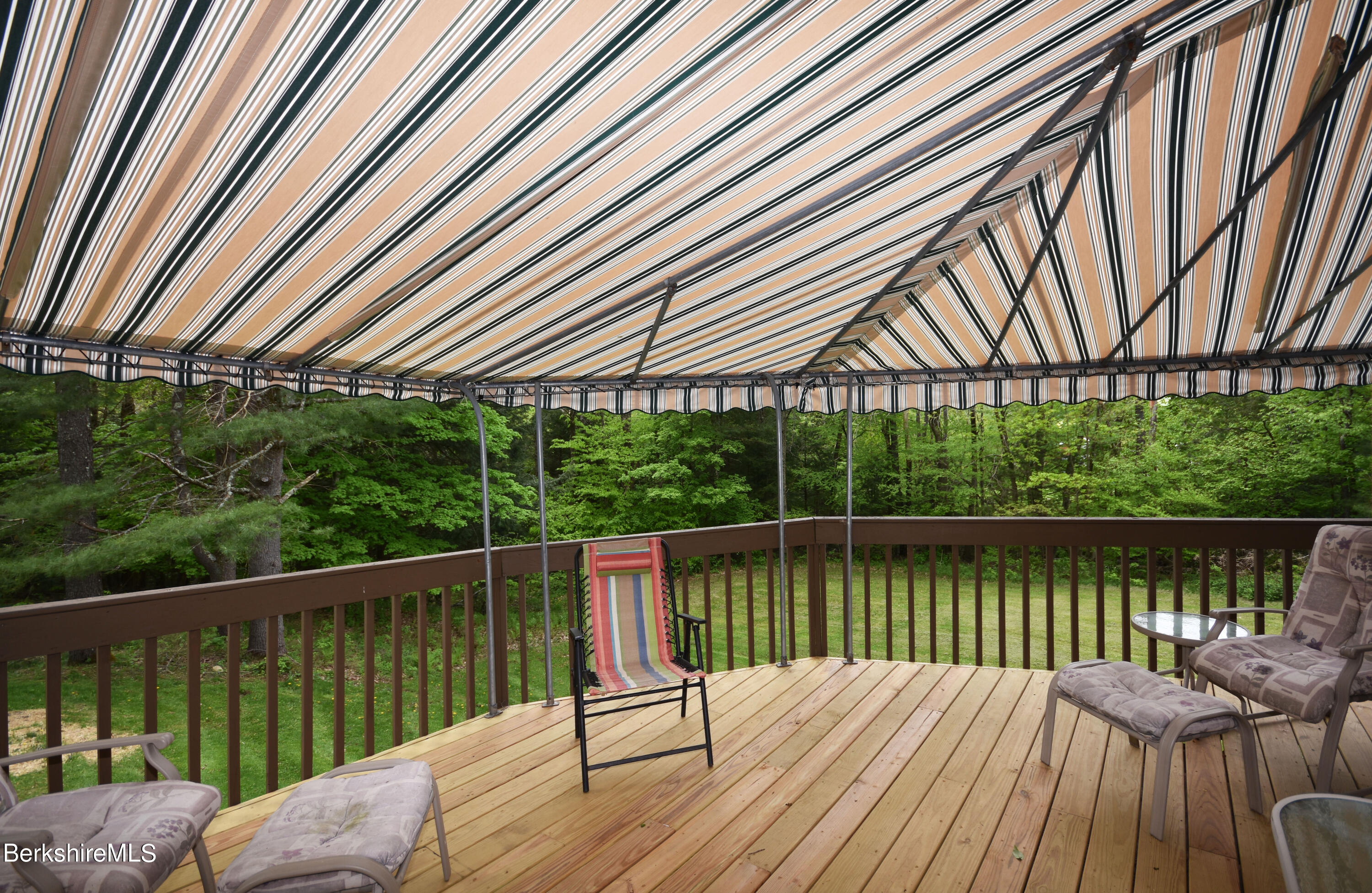 781 E Road Clarksburg, MA 01247 - Photo 45 of 51 a view of a wooden deck with a lake