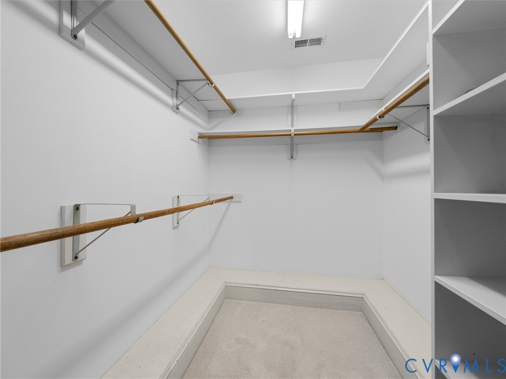 2011 Gamelaw Court Midlothian, VA 23113 - Photo 43 of 77 a view of walk in closet with empty racks