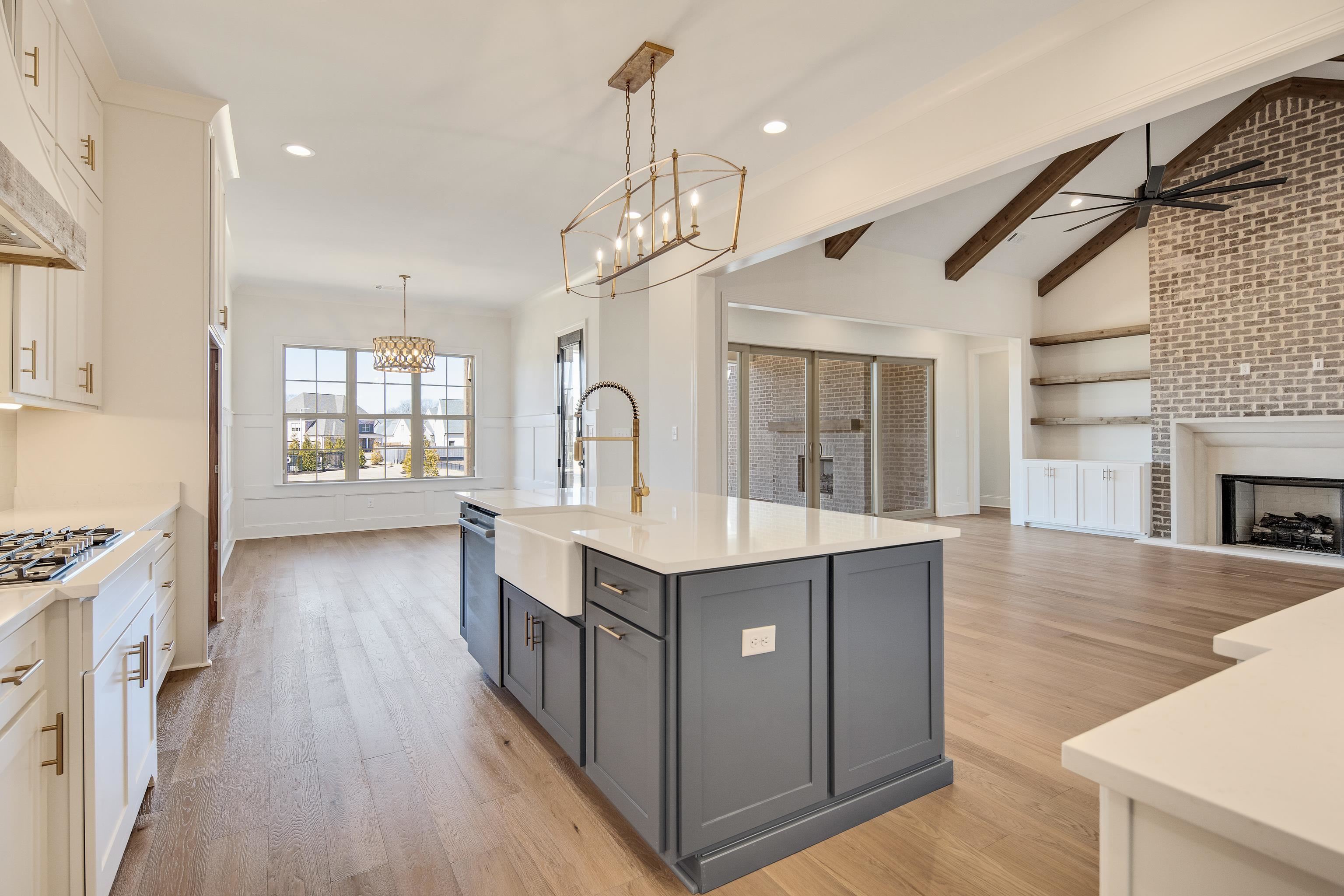 1207 Pipit Drive Collierville, TN 38017 - Photo 35 of 35 a view of living room kitchen island with wooden floor and electronic appliances