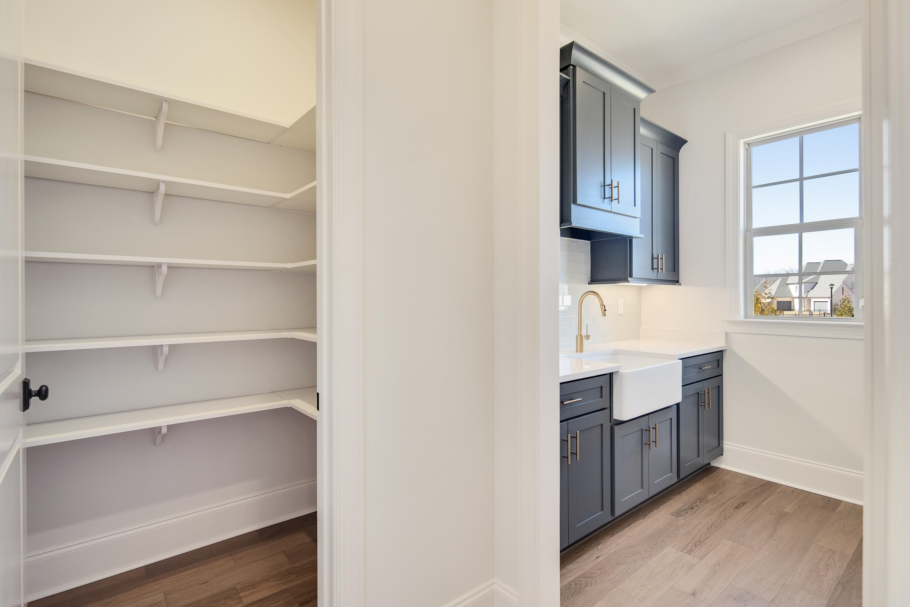 1207 Pipit Drive Collierville, TN 38017 - Photo 15 of 35 a kitchen with stainless steel appliances cabinets and a window