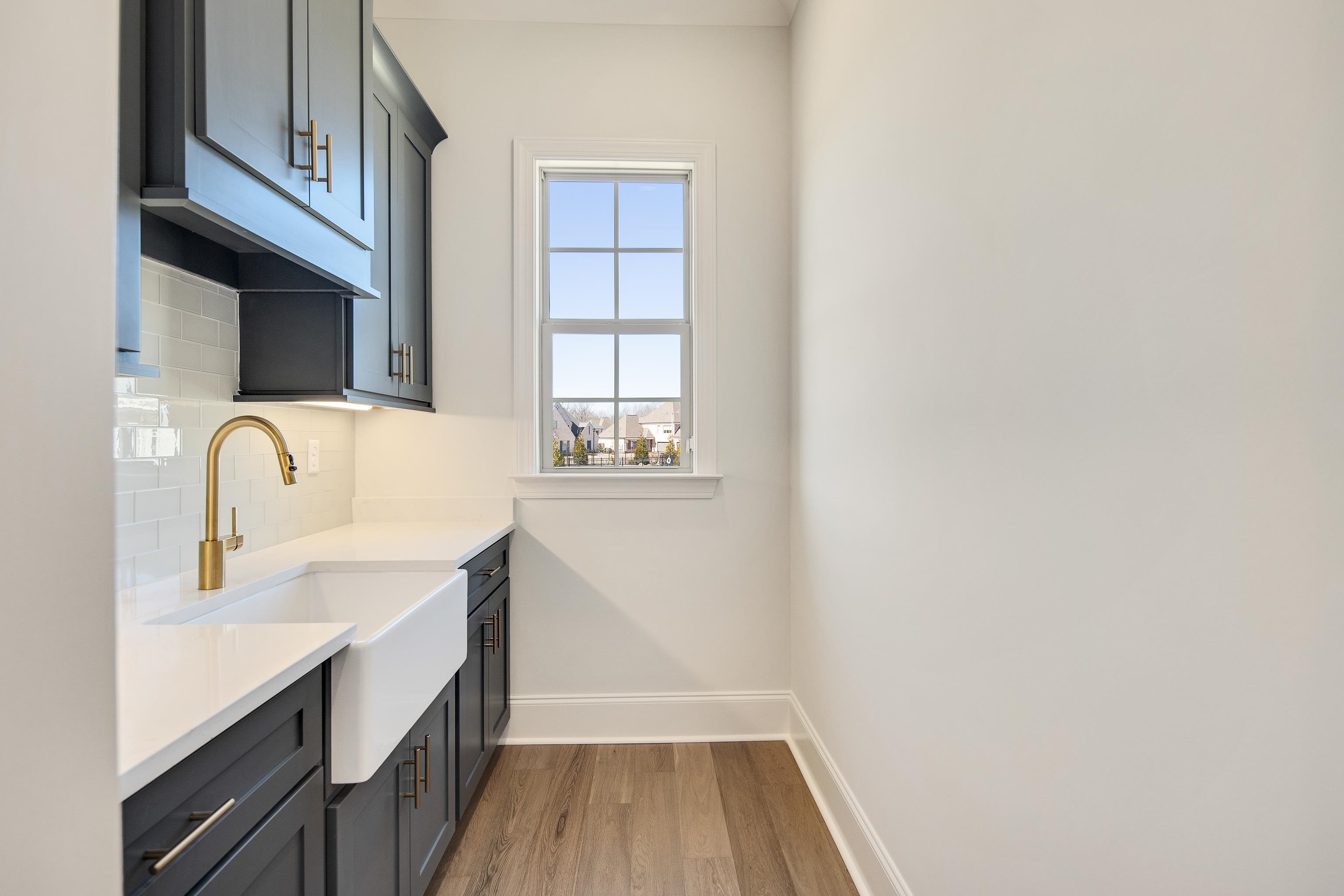 1207 Pipit Drive Collierville, TN 38017 - Photo 16 of 35 a bathroom with a sink and a bathtub
