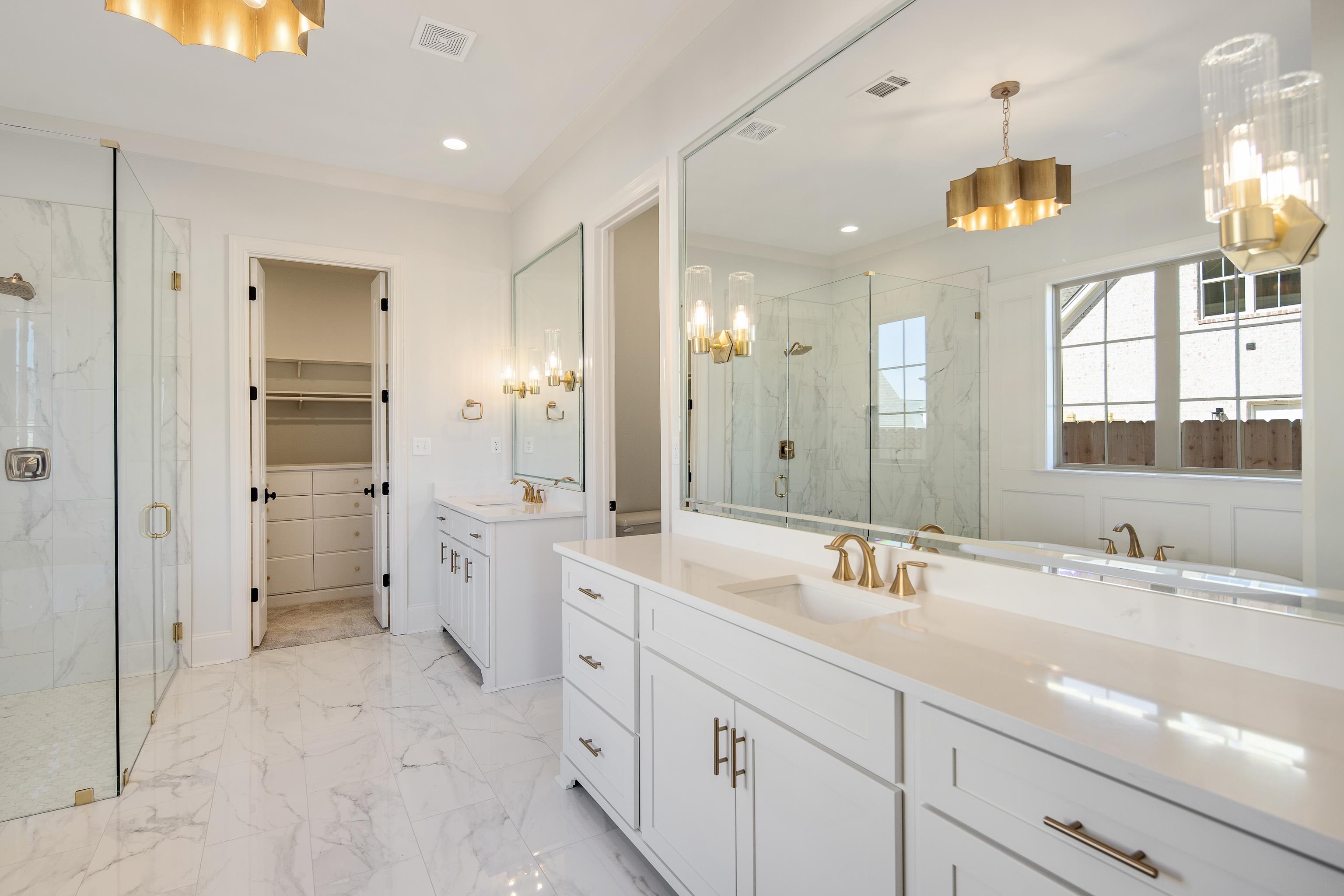 1207 Pipit Drive Collierville, TN 38017 - Photo 20 of 35 a bathroom with a sink double vanity and a shower