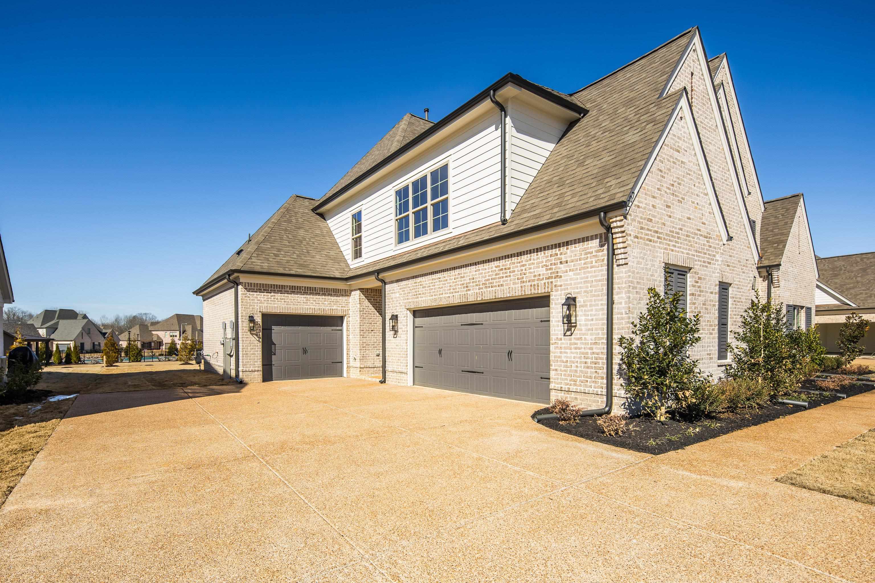 1207 Pipit Drive Collierville, TN 38017 - Photo 3 of 35 a view of a house with a outdoor space