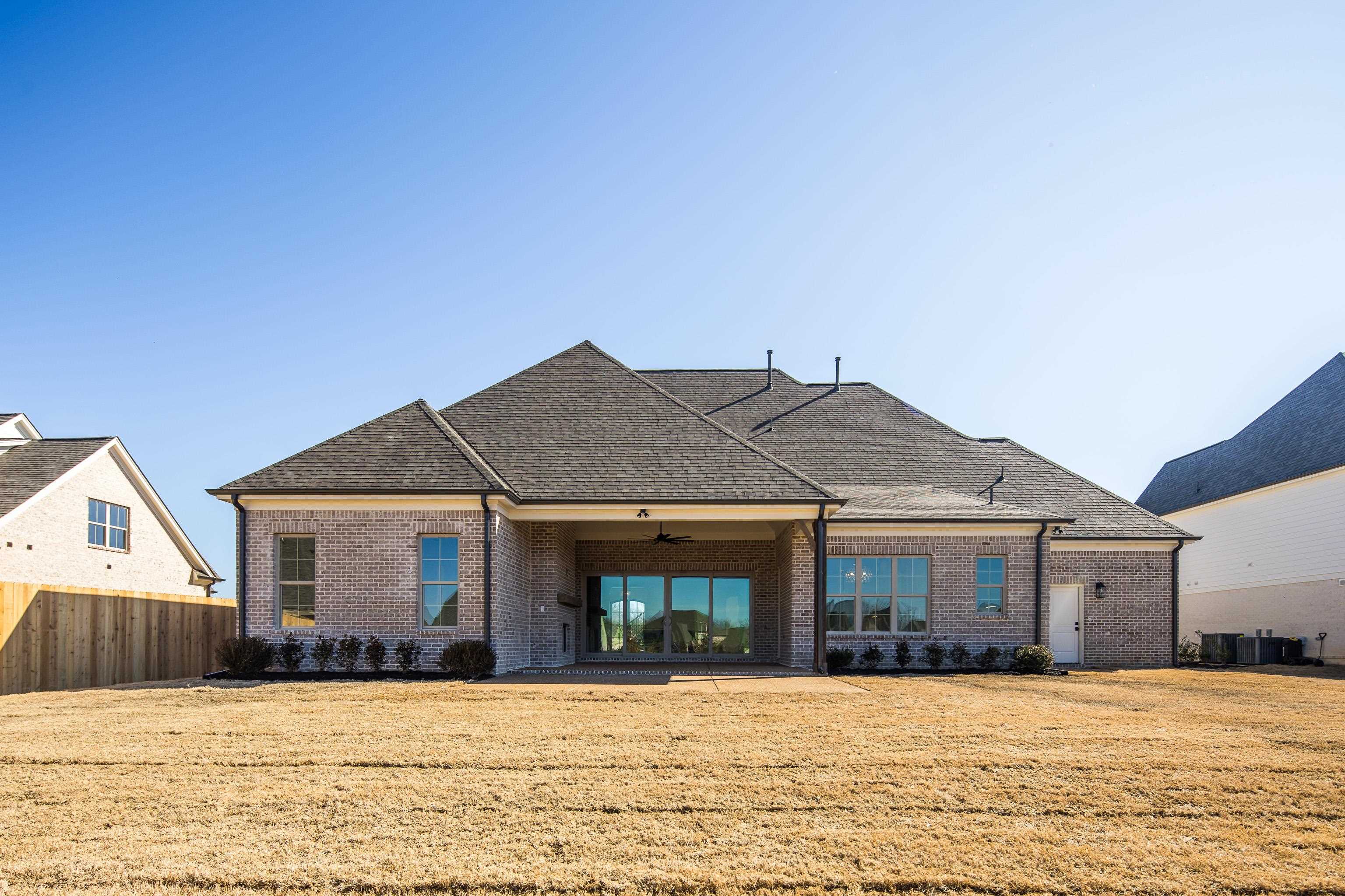 1207 Pipit Drive Collierville, TN 38017 - Photo 30 of 35 a front view of a house with a yard