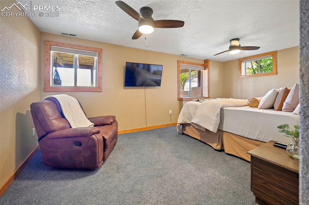 18560 Chelton Road Ramah, CO 80832 - Photo 24 of 34 a bedroom with bed and window