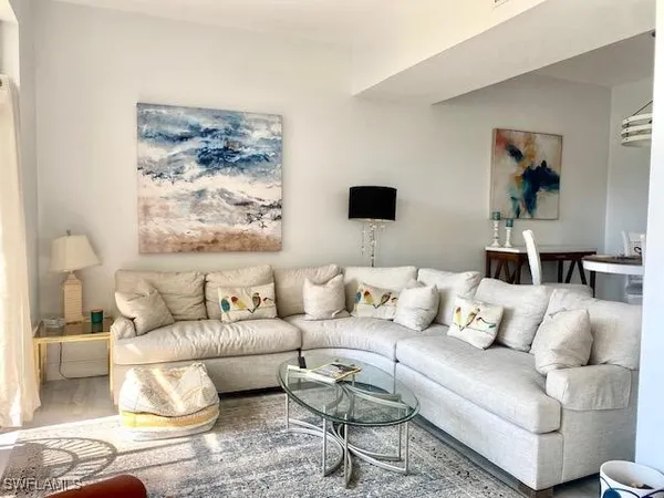 a living room with furniture and a couch